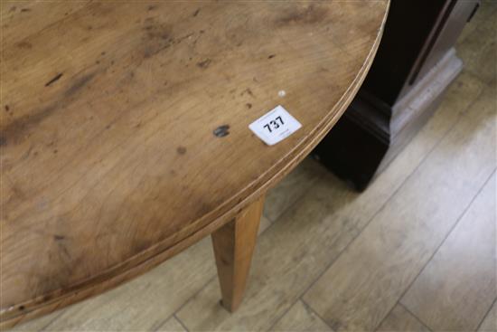 A French fruitwood demi lune fold out dining table, 124cm.